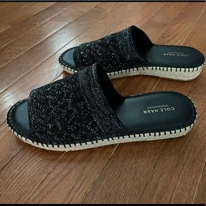 Women’s Cole Haan Black slides. 8.5M New, never worn.